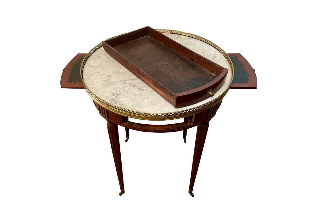 Elegant 19th Century French Louis XVI Revival mahogany and oak lined round bouillotte table