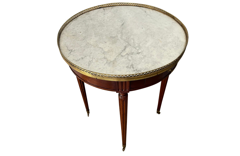 Elegant 19th Century French Louis XVI Revival mahogany and oak lined round bouillotte table