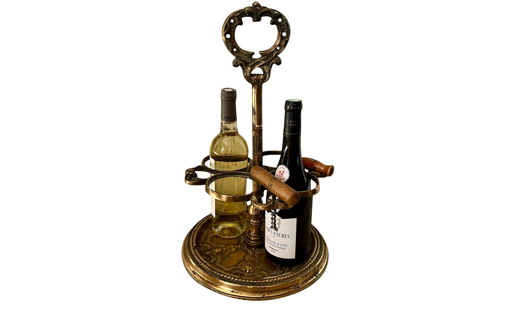 Decorative late 19th Century brass wine bottle holder from an old French brasserie.