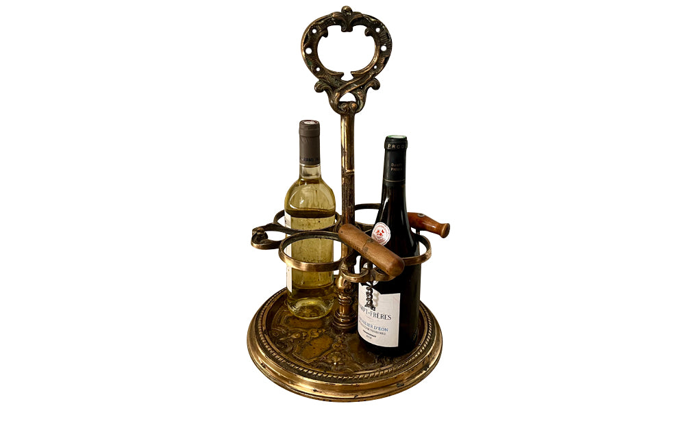 Decorative late 19th Century brass wine bottle holder from an old French brasserie.