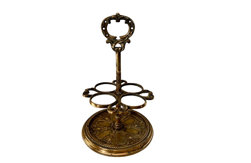 Decorative late 19th Century brass wine bottle holder from an old French brasserie.