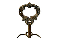 Decorative late 19th Century brass wine bottle holder from an old French brasserie.