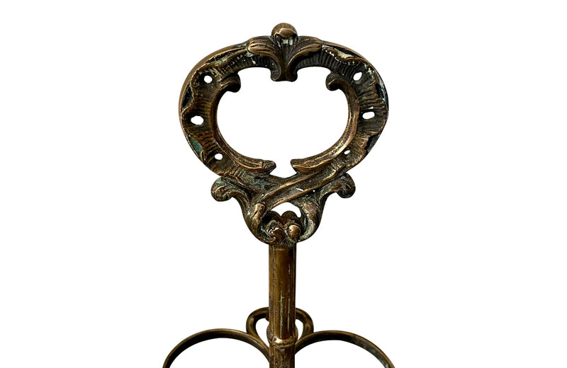 Decorative late 19th Century brass wine bottle holder from an old French brasserie.