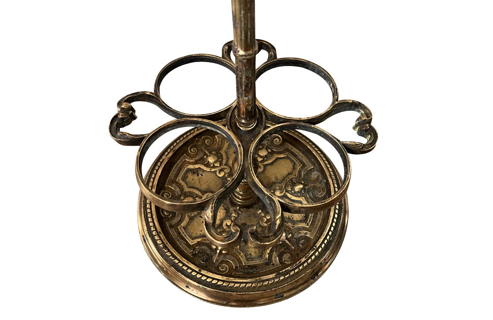 Decorative late 19th Century brass wine bottle holder from an old French brasserie.