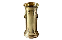 19th century brass umbrella or stick stand with lion head and bar handles and neo-classical style ornamentation.