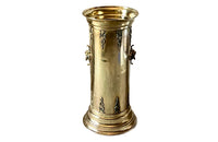 19th century brass umbrella or stick stand with lion head and bar handles and neo-classical style ornamentation.