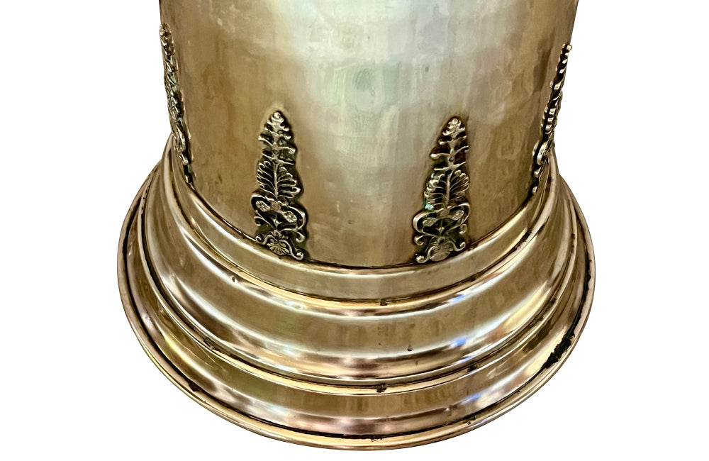 19th century brass umbrella or stick stand with lion head and bar handles and neo-classical style ornamentation.