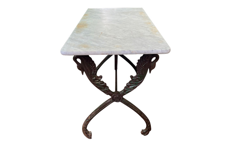 French bistro garden table with stunning cast iron swan design base with lovely green patination to base and old marble top circa 1900