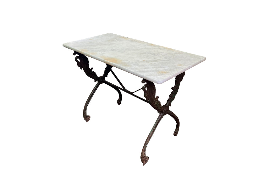 French bistro garden table with stunning cast iron swan design base with lovely green patination to base and old marble top circa 1900