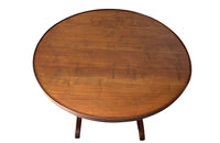 19th century small round cherry wood French vineyard table with turning lyre shaped support to shaped base