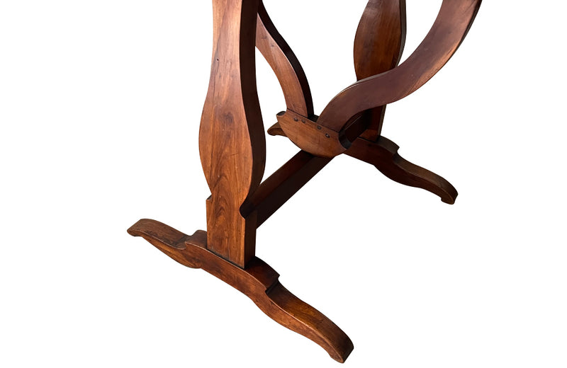 19th century small round cherry wood French vineyard table with turning lyre shaped support to shaped base