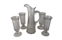 French 19th century Normandy glass jug and four matching tall stemmed glasses. 