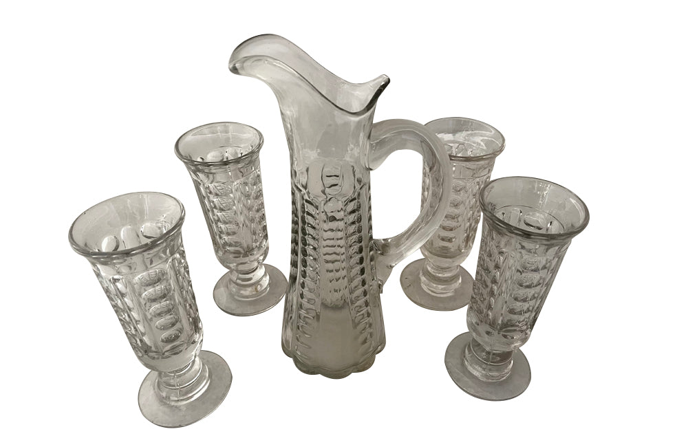 French 19th century Normandy glass jug and four matching tall stemmed glasses. 