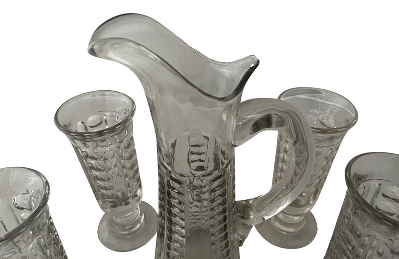 French 19th century Normandy glass jug and four matching tall stemmed glasses. 