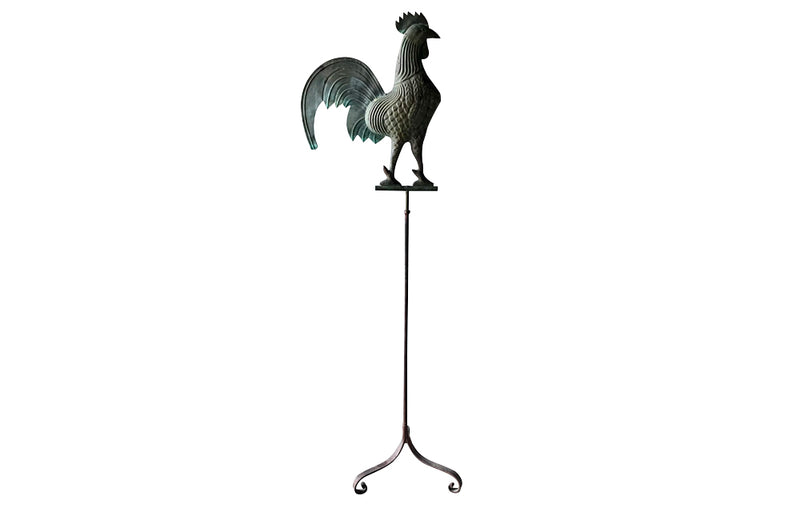 Charming, full-bodied vintage copper weather cock presented on a 19th century iron stand.