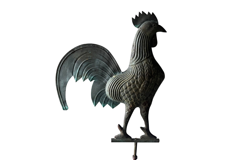 Charming, full-bodied vintage copper weather cock presented on a 19th century iron stand.