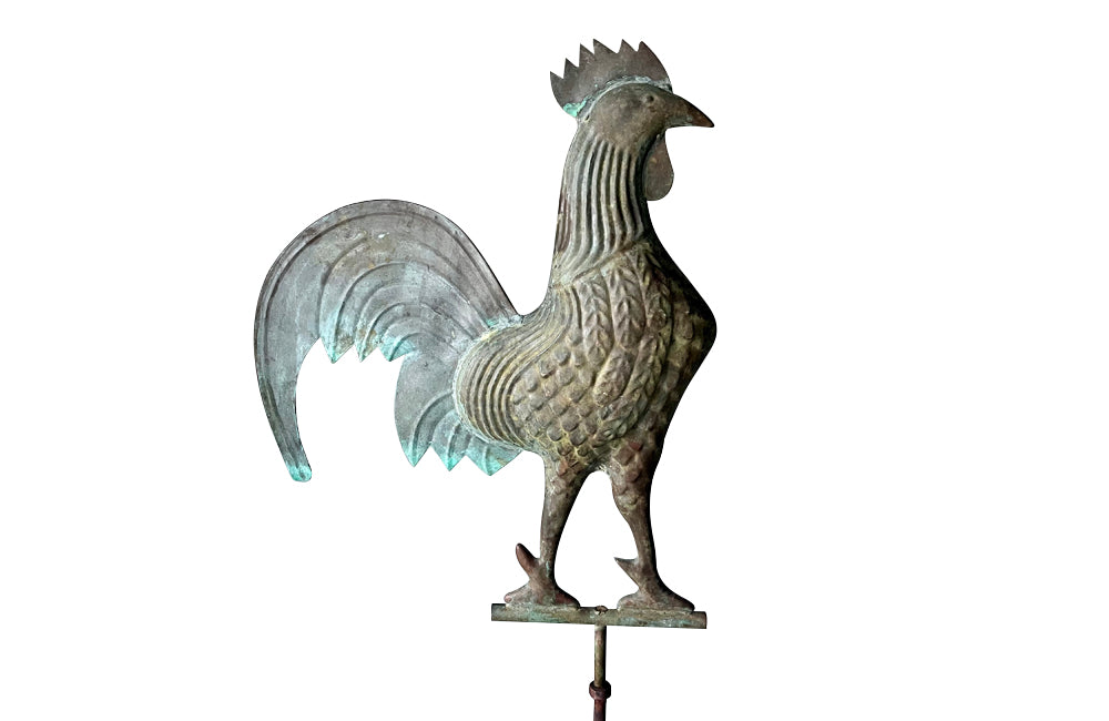 Charming, full-bodied vintage copper weather cock presented on a 19th century iron stand.