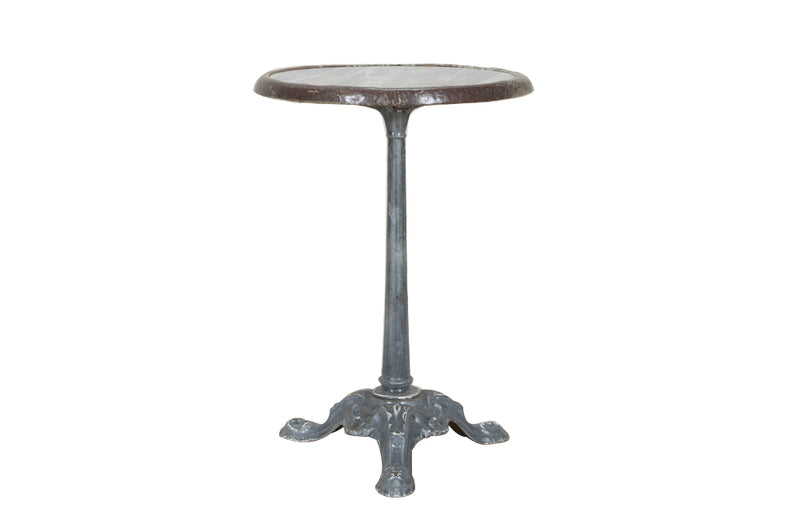 19th Century French enamelled bistro table with round grey marble top with brass surround