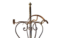Tall late 19th Century French iron coat and hat rack.