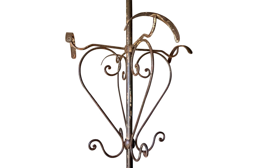 Tall late 19th Century French iron coat and hat rack.