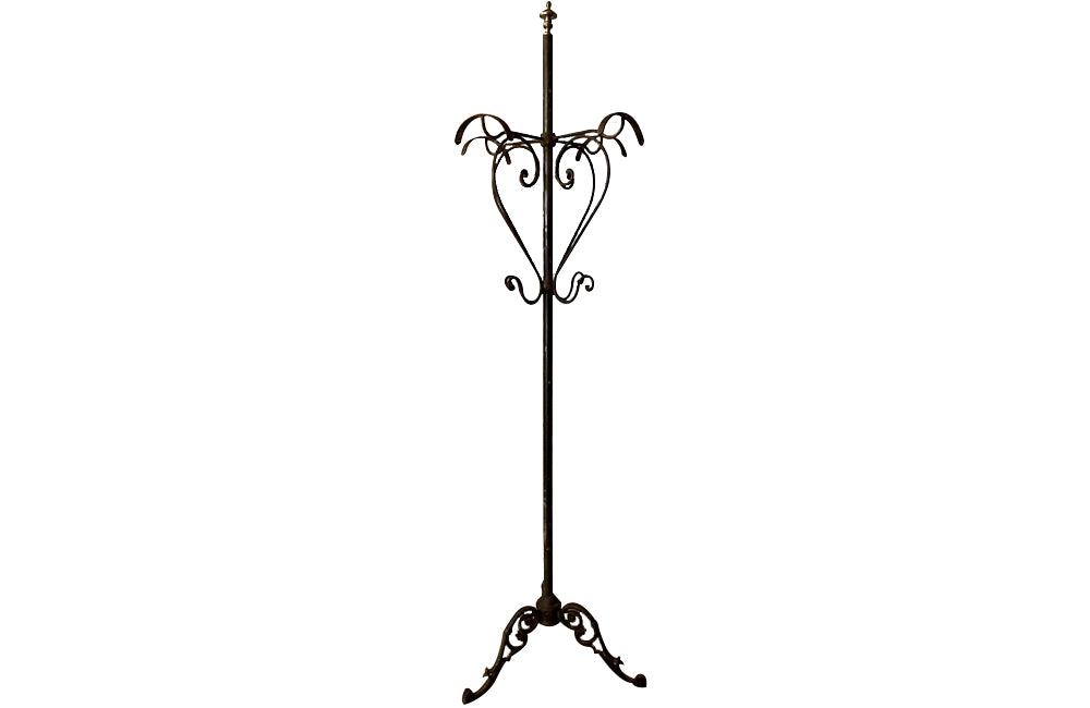 Tall late 19th Century French iron coat and hat rack.