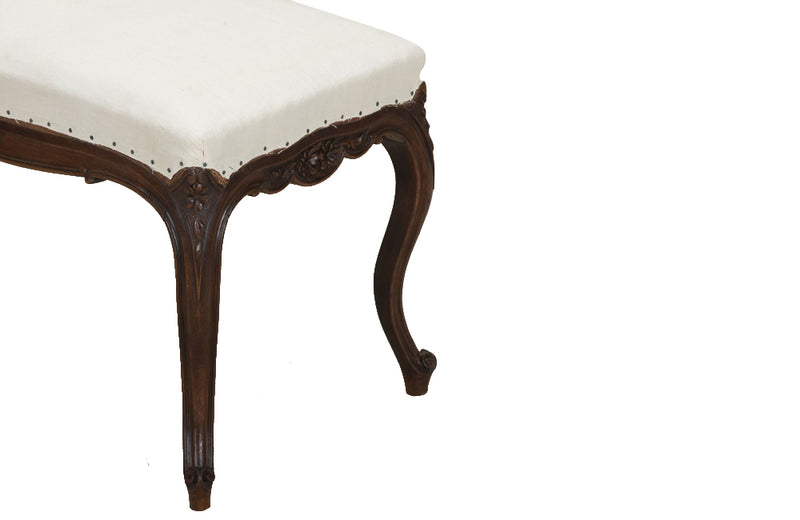 Antique bench or banquette 19th Century French walnut in the Louis XV style. French antique furniture.