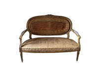 19th century, elegant giltwood carved canapé sofa in the Louis XVI style