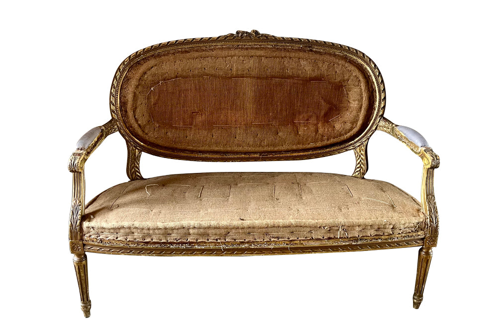 19th century, elegant giltwood carved canapé sofa in the Louis XVI style