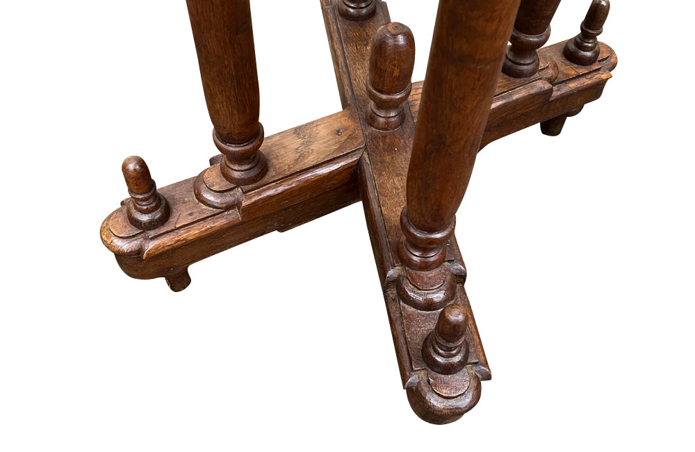 A charming 19th century French oak side table from the Alsace Region .