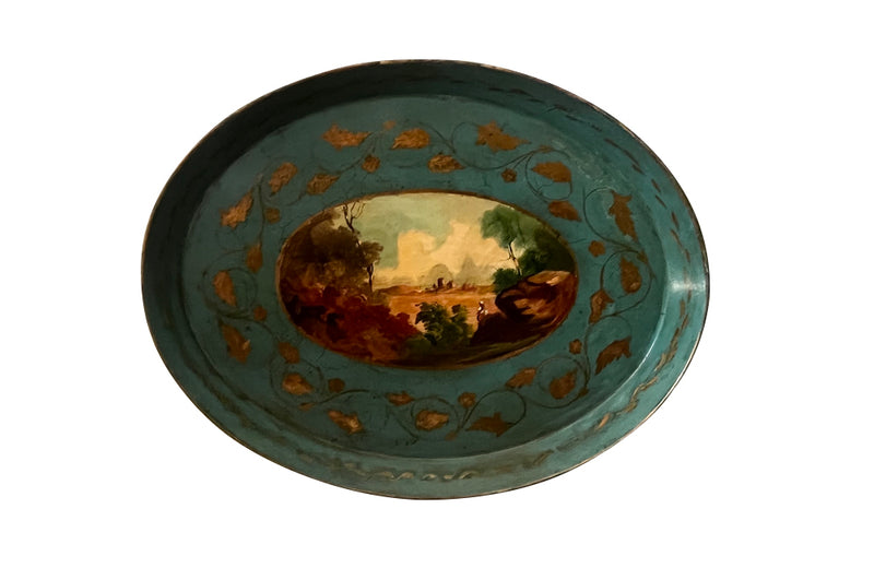 Decorative 19th centiry Italian tole tray with a scenic painting and gold leaf details