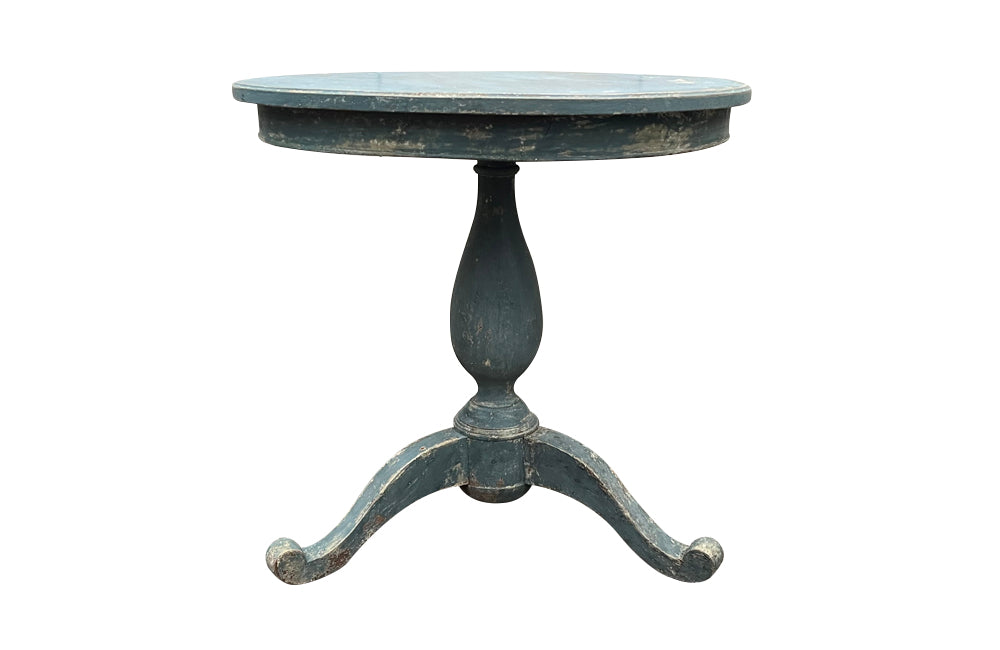19th century Swedish or Scandinavian round table on a turned central pedestal with a tripod base