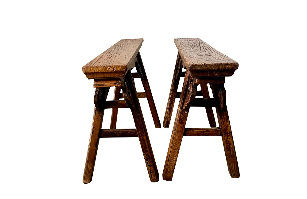 Pair of 19th century Chinese elm benches from the late Qing Period.