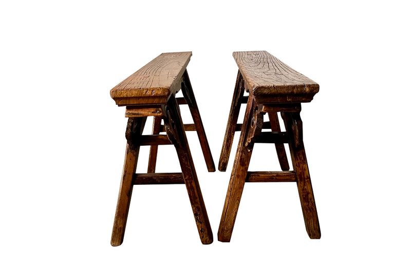 Pair of 19th century Chinese elm benches from the late Qing Period.