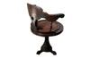 19th Century French carved wooden ships chair with leather seat and heavy cast iron base.