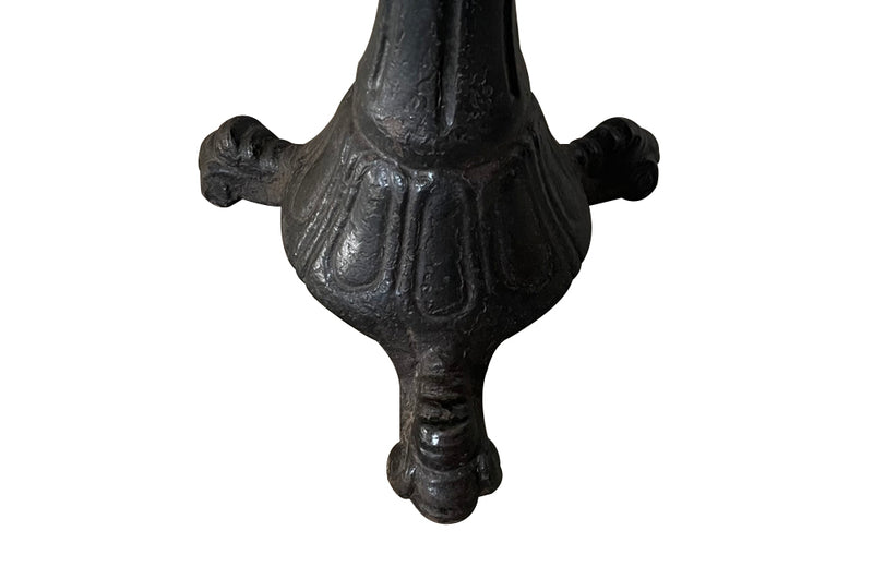 19th Century French carved wooden ships chair with leather seat and heavy cast iron base.