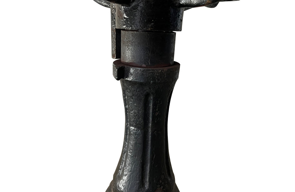 19th Century French carved wooden ships chair with leather seat and heavy cast iron base.