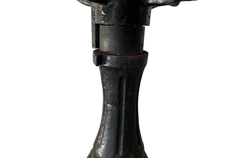 19th Century French carved wooden ships chair with leather seat and heavy cast iron base.