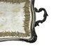 Decorative early 20th Century French Louis XV style worn silver plate on brass tray with ornate handles.