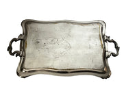 Decorative early 20th Century French Louis XV style worn silver plate on brass tray with ornate handles.