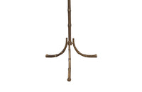 A Maison Bagues attributed faux bamboo brass floor lamp