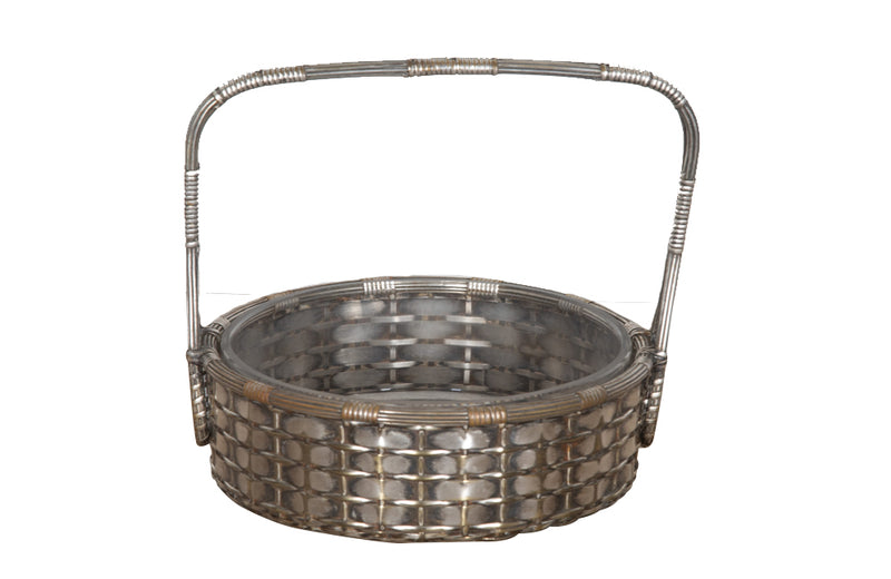 Elegant, round silver plate basket with handle