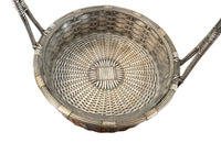 Elegant, round silver plate basket with handle