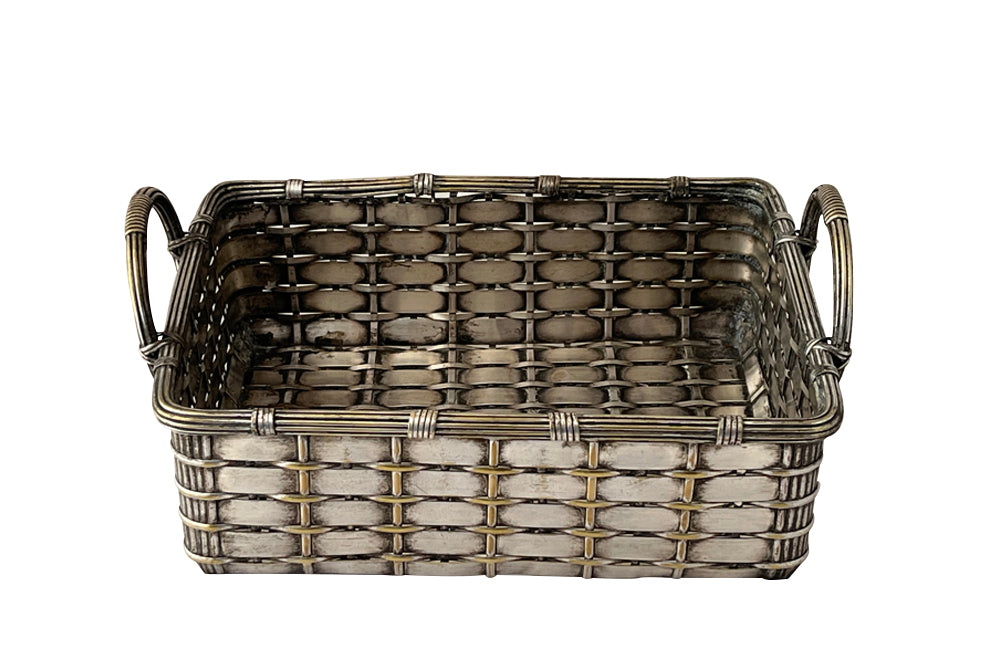Elegant, silver plate basket with round handles
