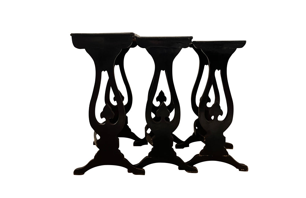 Nest of three black lacquered chinoiserie tables circa 1920