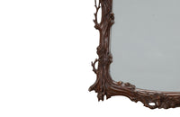 Pair of 20th Century decorative mirrors carved with climbing branches and flowers.&nbsp;