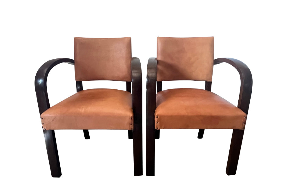 Art Deco style bridge chair armchairs with wide arched arms that incorporate the front legs, in the manner of Jindřich Halabala - 