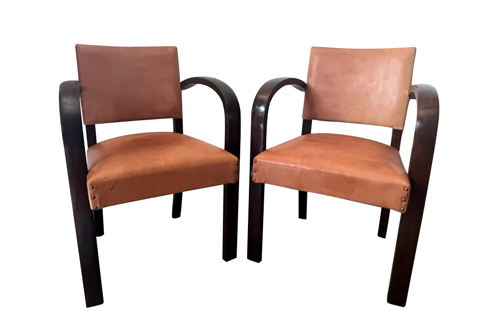 Art Deco style bridge chair armchairs with wide arched arms that incorporate the front legs, in the manner of Jindřich Halabala - 