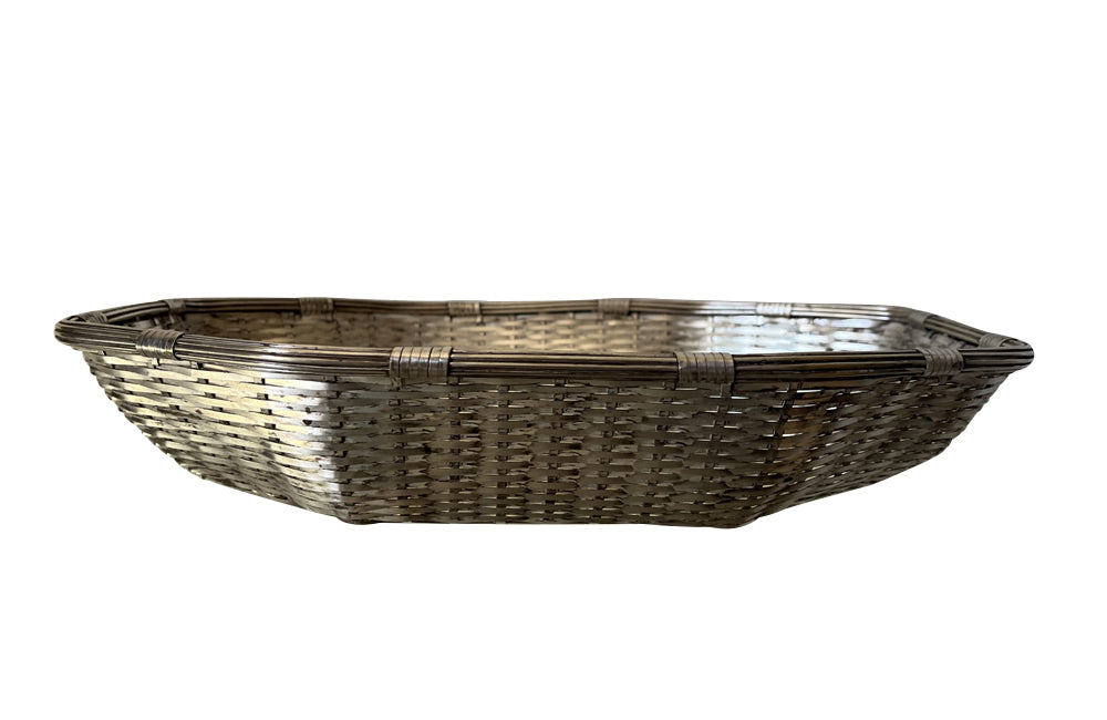 French silverplate woven bread basket in octagonal form.