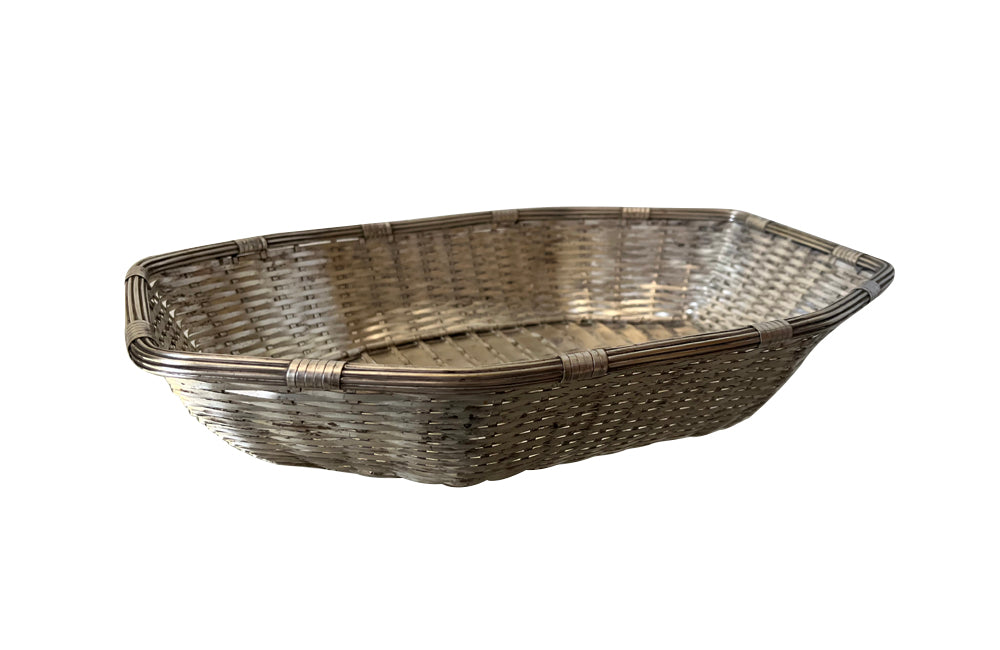 French silverplate woven bread basket in octagonal form.