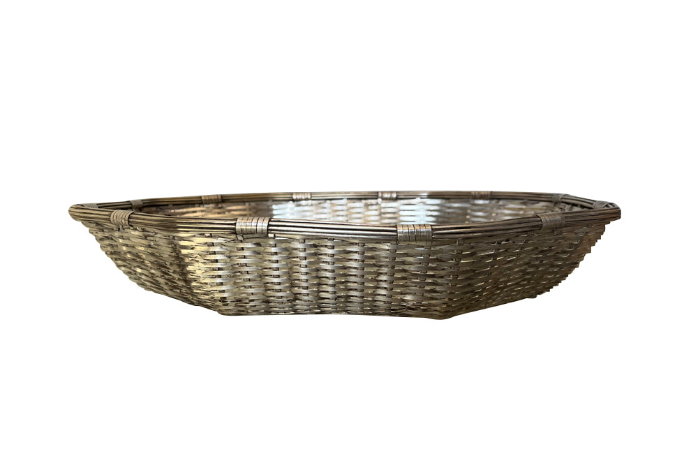 French silverplate woven bread basket in octagonal form.